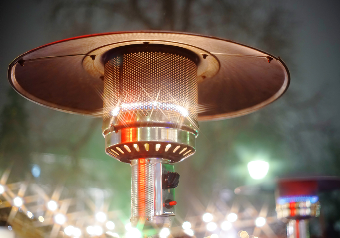 Close-up of propane-powered outdoor patio heater.