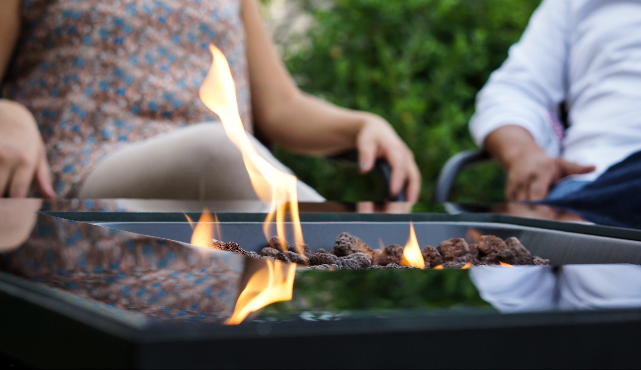 Close-up of flames coming from a propane-powered fire pit.