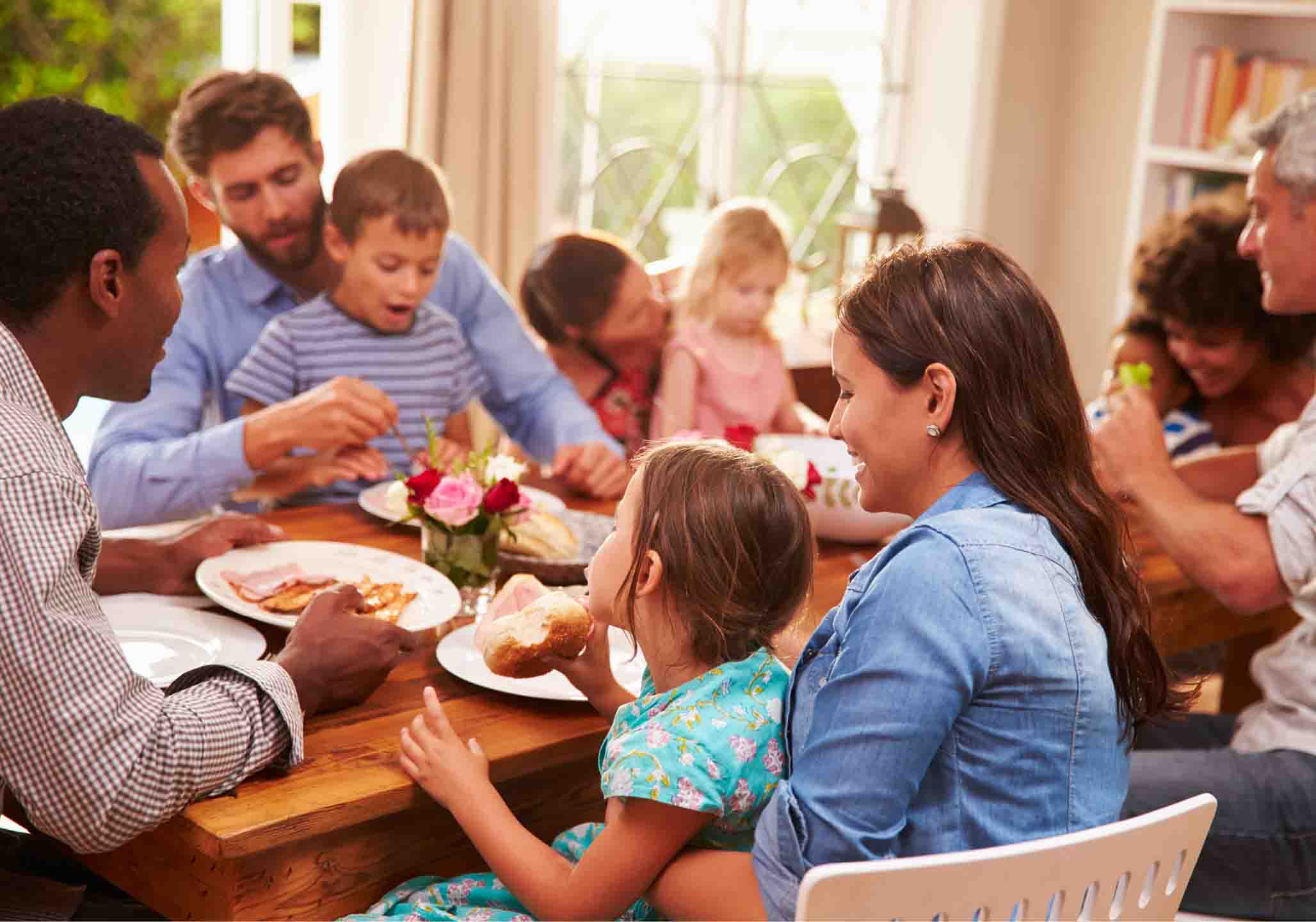 Family get together around dining room table
