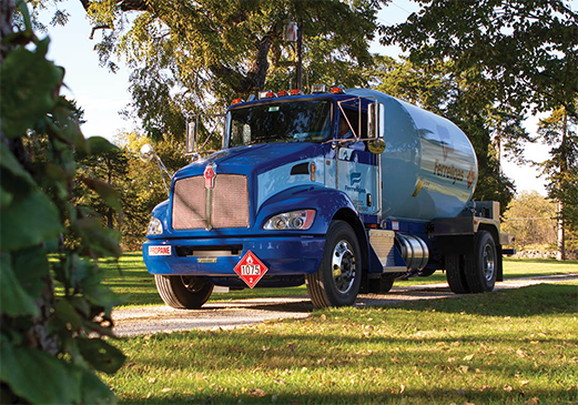 A Ferrellgas delivery truck enters a residential customer’s driveway.