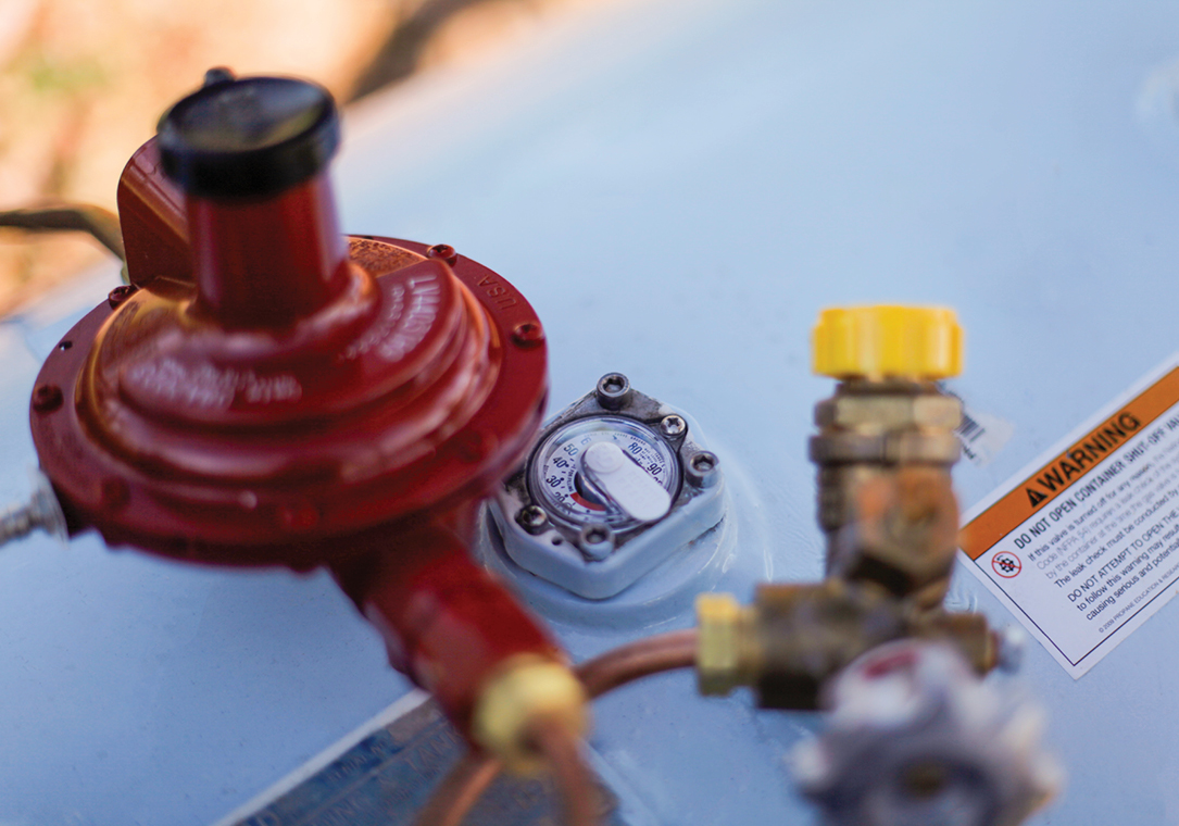 Close-up image of a propane tank gauge.