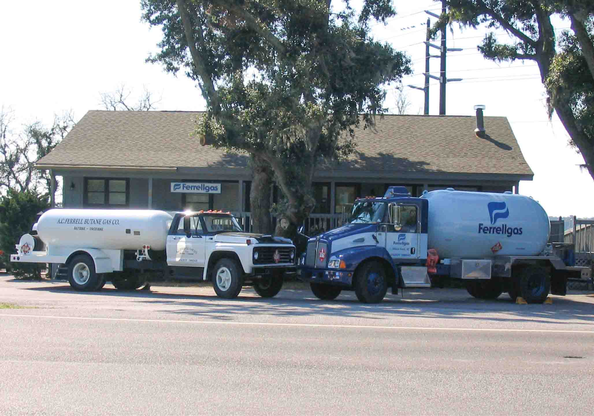 Ferrellgas local office exterior with an old style bobtail truck and a modern bobtail truck