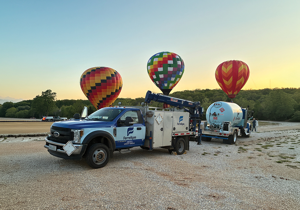 Ferrellgas trucks are parked in front of hot air balloons.